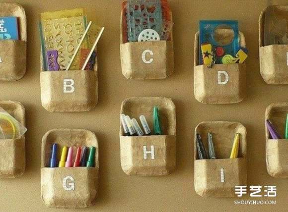 一次性塑料饭盒手工制作好用的储物盒收纳墙(图1)