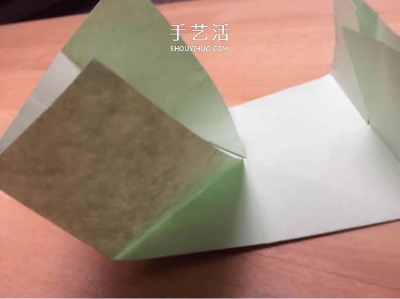旋转纸陀螺怎么折图解 简单花型陀螺折纸教程(图6)