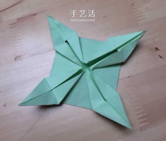 旋转纸陀螺怎么折图解 简单花型陀螺折纸教程(图16)