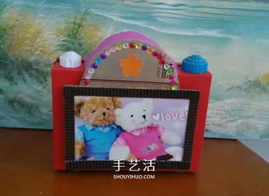幼儿园手工作品图片 废物利用做的漂亮相机(图6)