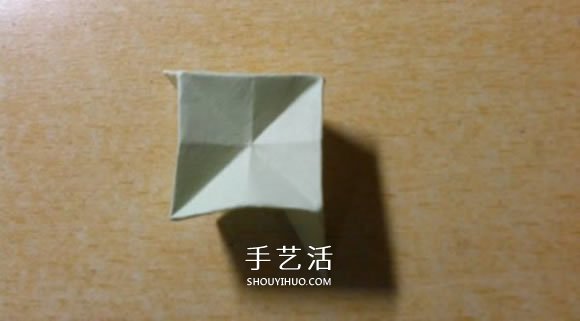 镂空纸花球怎么折图解 简单手工花球的折法(图7)